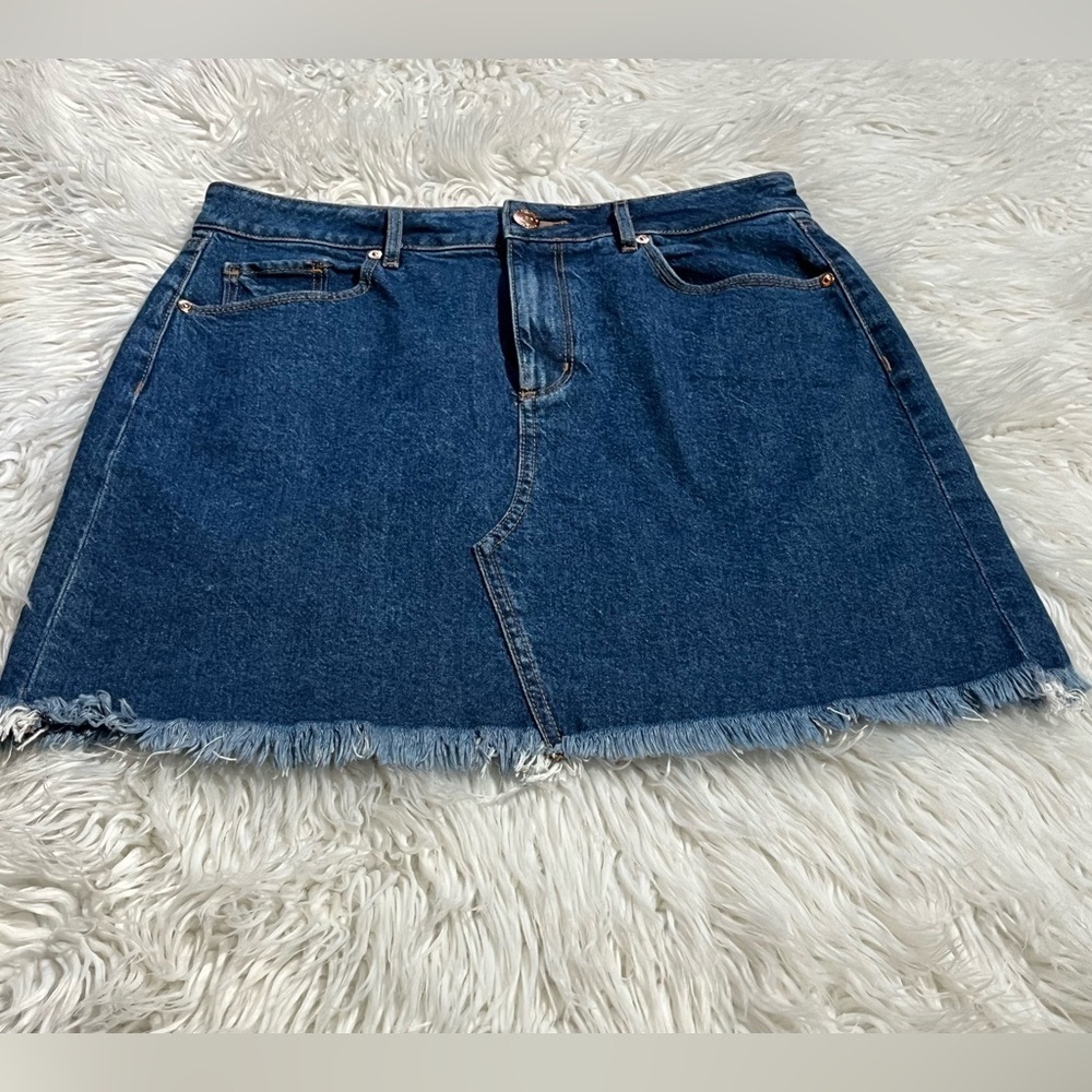 Distressed Deconstructed Frayed Hem Medium Wash Cut Off Denim Mini Skirt